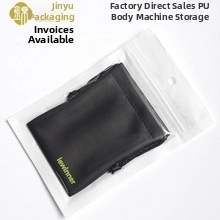 Detail of black textured PU leather storage pouch with automatic spring closure