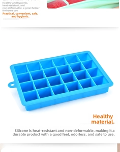 Detailed view of flexible blue 24-cavity square silicone ice cube tray with soft texture