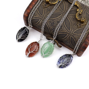 Handmade tree of life wire wrapped oval crystal pendant necklaces in four vibrant stone colors