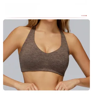 Detail of coffee brown heather sports bra featuring a V-neckline and elastic texture