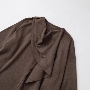 Dark brown knit cardigan coat with elegant draped collar and premium soft texture