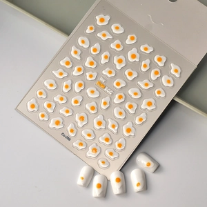 3D fried egg nail art stickers featuring sunny side up patterns on white background