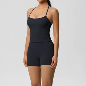 Detail of black seamless yoga set with spaghetti strap top and high-waist shorts
