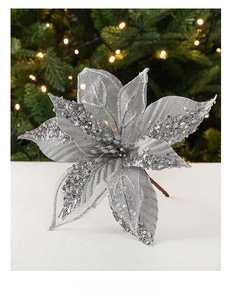 Close-up of silver Christmas poinsettia decoration with mesh fabric and sparkling sequins