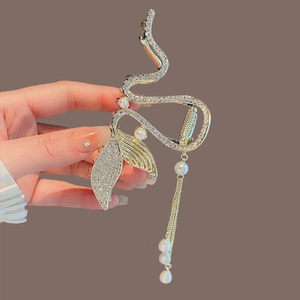 Golden mermaid tail hair claw clip with rhinestones and elegant pearl tassels