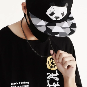Detailed view of punk style black stainless steel twist chain necklace on a model