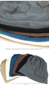 Detail of breathable ribbed knit slouchy beanies with cloud patches in multiple colors