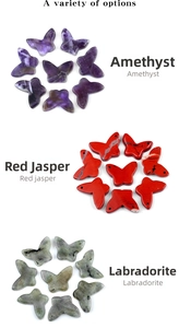 Detailed view of butterfly-shaped natural amethyst, red jasper and labradorite stone pendants