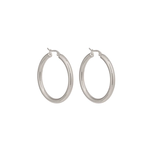 Macro shot of polished silver stainless steel hoop earrings with smooth metallic finish