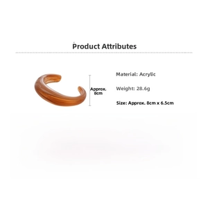 Detail view of amber translucent acrylic bangle with dimensions and weight specs
