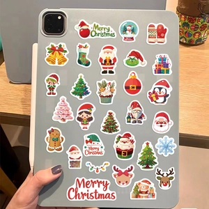 Christmas cartoon stickers with Santa and reindeer motifs applied on a tablet back