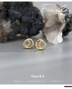 Macro detail of gold plated hoop earrings featuring sparkling pavé set zircon crystals