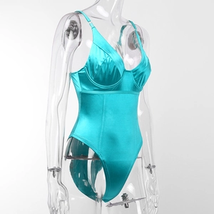 Detail of lake blue satin bodysuit featuring thin straps and high-gloss finish