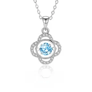 Close-up of S925 sterling silver daisy pendant with blue stone and zircon accents
