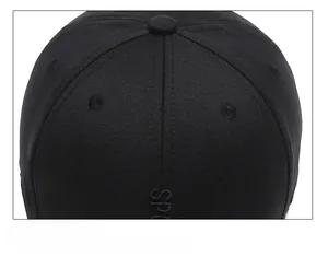 Detail view of reinforced stitching on black baseball cap with SPORT embroidery
