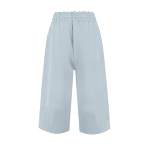 Detail of high-waisted elastic waistband with drawstring on blue linen wide-leg pants