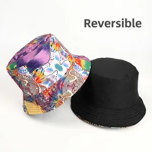 Reversible bucket hat with colorful abstract graffiti print and classic black inner lining