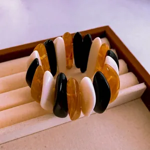 Retro geometric acrylic beaded stretch bracelet in black cream and amber tones