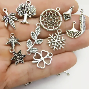Handheld assorted silver alloy leaf and flower charms for DIY jewelry making
