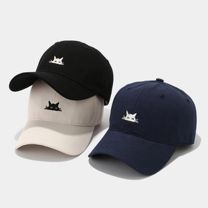 Embroidered cat baseball caps in black, beige, and navy cotton for men and women