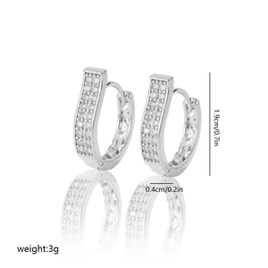 Silver U-shaped hoop earrings with micro-pave cubic zirconia and hollow pattern details
