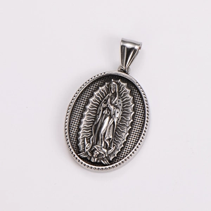Detailed relief of Our Lady of Guadalupe on an oval silver stainless steel pendant