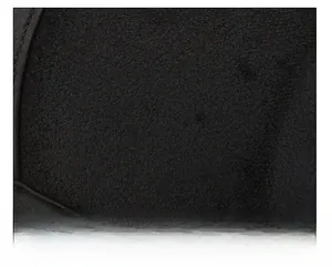 Detailed view of black thermal fabric for men's winter cap showing soft texture