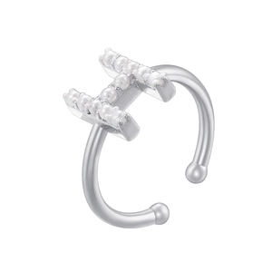 Detailed view of silver open ring with letter H and pearl accents on white background
