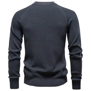 Deep grey-blue men's crewneck knit sweater with long sleeves and detailed knit texture