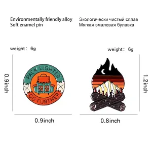 Outdoor adventure enamel pins with mountain campfire and pack lighter go further slogans