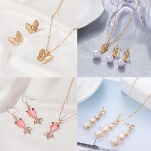 Detailansicht von vier Schmucksets mit Perlen und Kristallen in floralen und geometrischen Designs