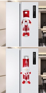 Close-up of Christmas gnome refrigerator handle covers in red and white plush fabric