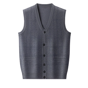 Detail of grey checkered knit vest featuring V-neckline and button-up closure style