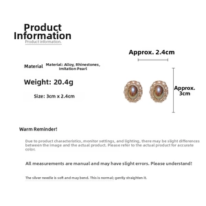 Detailed view of vintage oval pearl earrings with size 3cm by 2.4cm and 20.4g weight specs
