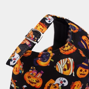 Detailed close-up of the adjustable metal buckle and Halloween prints on the baseball cap