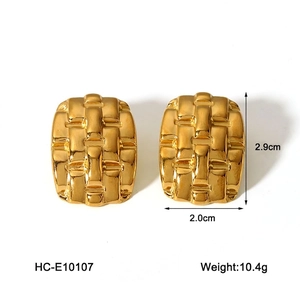 Detail view of woven texture gold earrings with measurements 2.9cm by 2.0cm and 10.4g weight