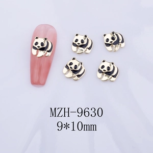 Detailed close-up of 9x10mm gold panda nail charms with black and white drip oil finish
