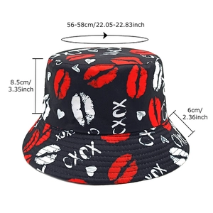Black canvas bucket hat with red lips and XOXO print featuring full sun protection