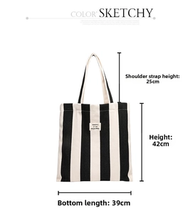 Detailed size chart for black and white striped canvas tote bag with 39cm length and 42cm height