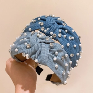 Fashionable denim knotted headband featuring sparkling rhinestones and white pearls set