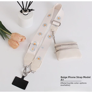 Detail of cream-colored wide crossbody phone strap with daisy print and small coin purse