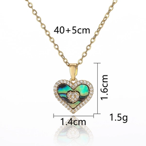 Detail showing shell butterfly pendant measurements and golden stainless steel chain texture