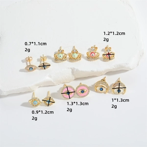 French vintage crown and evil eye stud earrings with colorful enamel on white stone