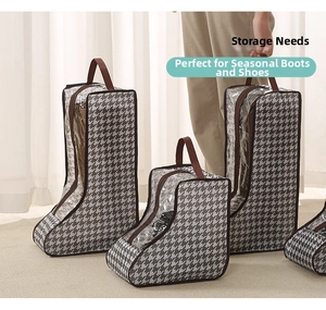 Detail view of houndstooth shoe storage bags with transparent PVC windows and handles