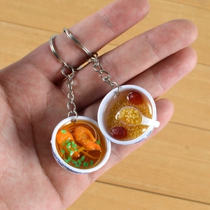 Miniature blue and white porcelain bowl pendants with shrimp noodle and congee food models