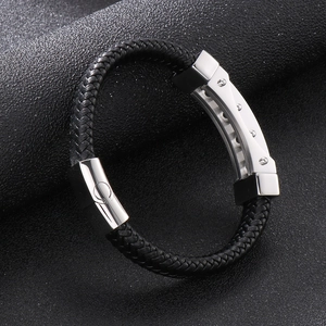 Men's black woven leather bracelet with silver stainless steel clasp and industrial metal plate