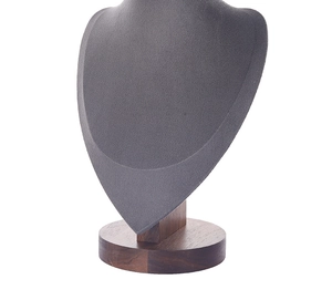 Close-up of grey velvet necklace display stand with premium dark walnut wooden base