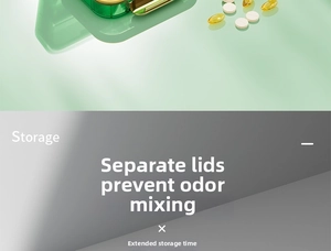 Detail of green portable pill organizer with individual lids and gold metal buckle