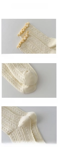 Detail view of cream ruffle cuff, reinforced toe and heel of breathable cotton socks