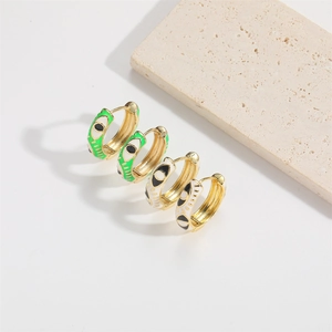 Minimalist evil eye hoop earrings with gold metal and green white enamel finish